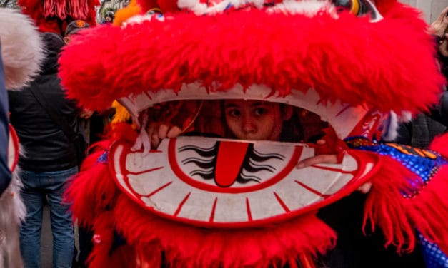 Red lion with open mouth