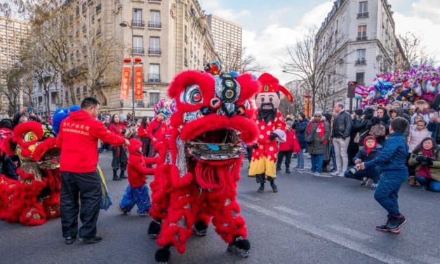 Red lion and big-head figure